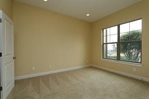 spare room with carpet floors