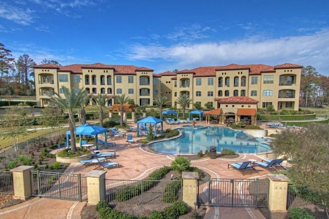 view of swimming pool with a patio area