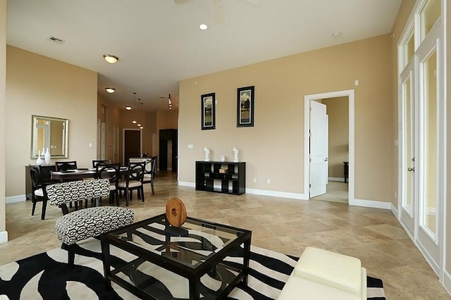 living room featuring ceiling fan