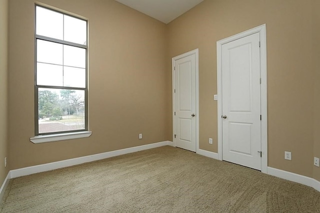 unfurnished bedroom with carpet