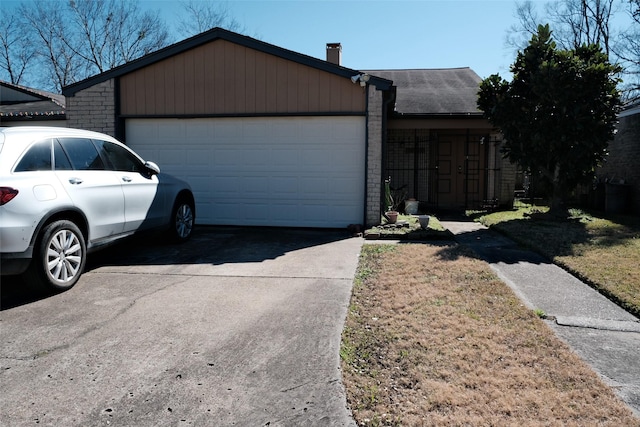 exterior space with a garage