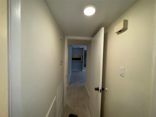 hallway featuring light wood-type flooring