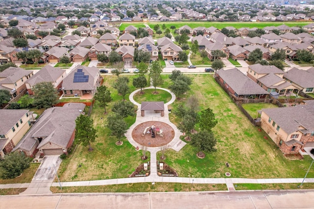 birds eye view of property with a residential view