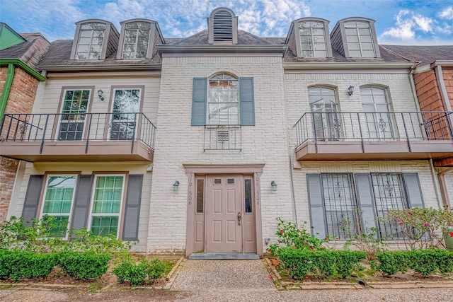 view of front of property with brick siding