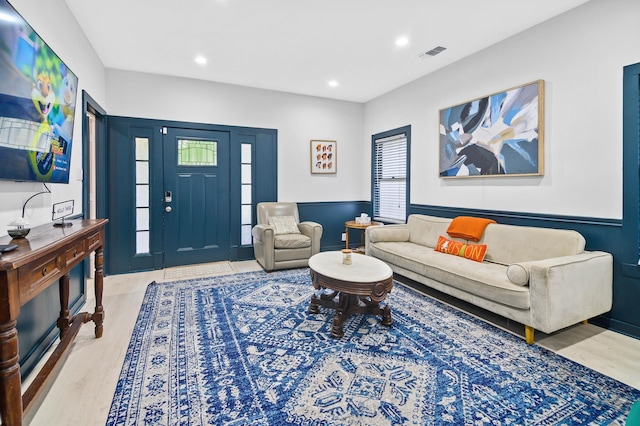 living room with light hardwood / wood-style floors