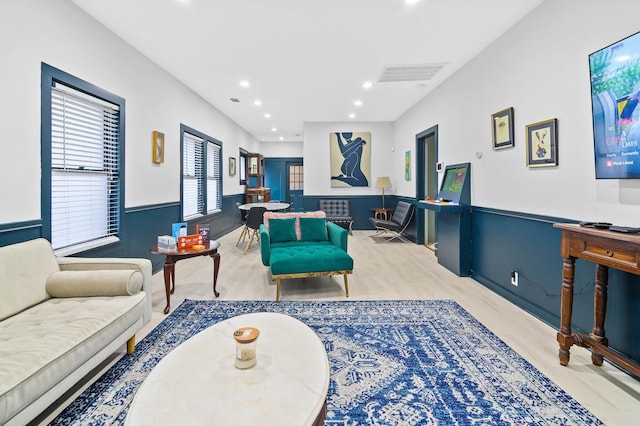 living room with light hardwood / wood-style floors