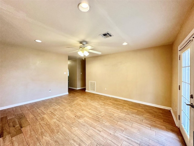 unfurnished room featuring ceiling fan and light hardwood / wood-style floors