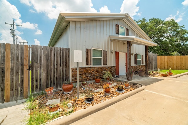 view of front of home with a patio area