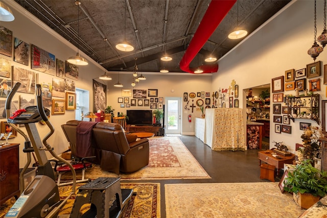 living room with a high ceiling