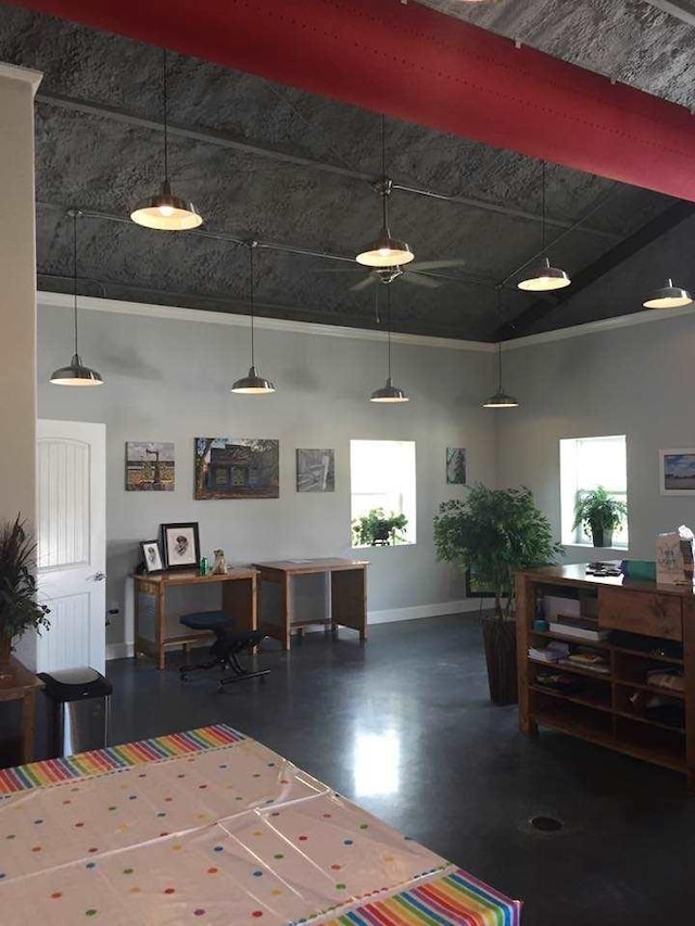 interior space featuring a towering ceiling