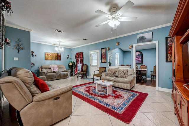 living room with ornamental molding, arched walkways, visible vents, and light tile patterned floors