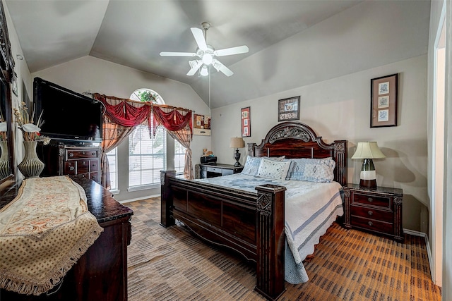 bedroom featuring lofted ceiling, carpet, a ceiling fan, and baseboards