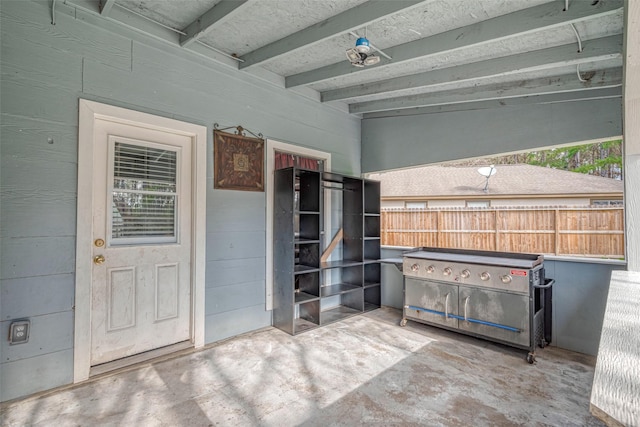 view of patio featuring fence and area for grilling