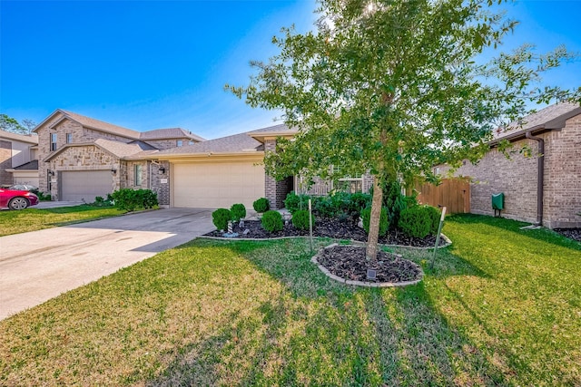 view of front of home with a garage and a front yard