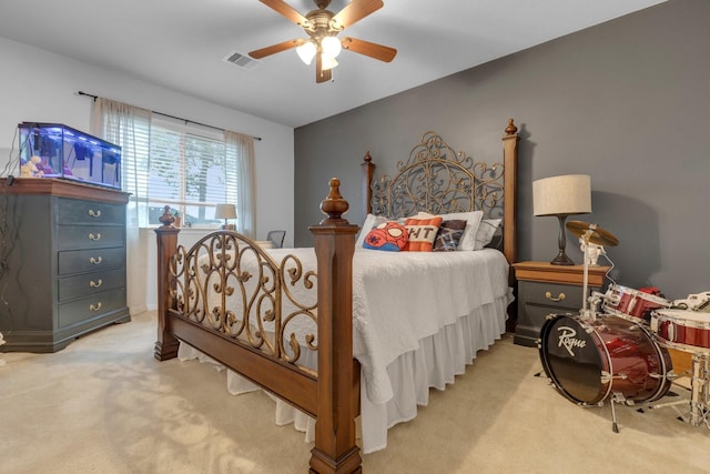 carpeted bedroom featuring ceiling fan