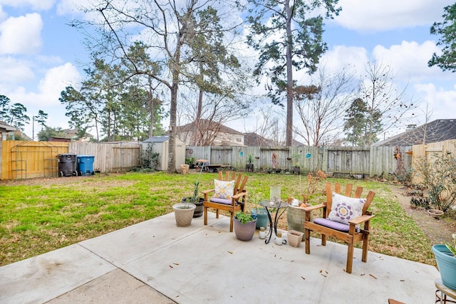 view of patio featuring a shed