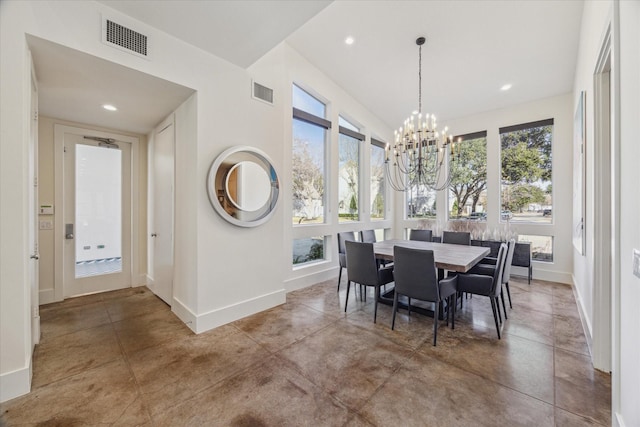 dining room with vaulted ceiling and an inviting chandelier