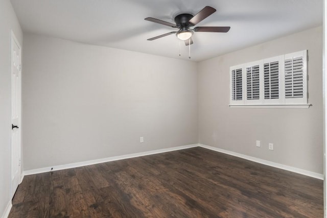 unfurnished room featuring dark hardwood / wood-style floors and ceiling fan