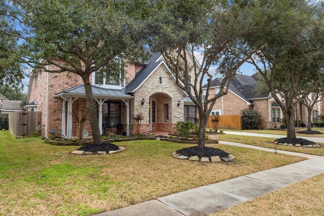 view of front facade with a front yard