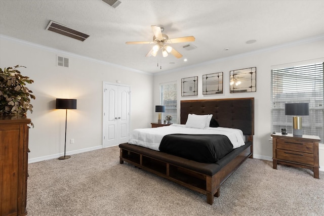 carpeted bedroom with multiple windows, crown molding, a textured ceiling, and ceiling fan