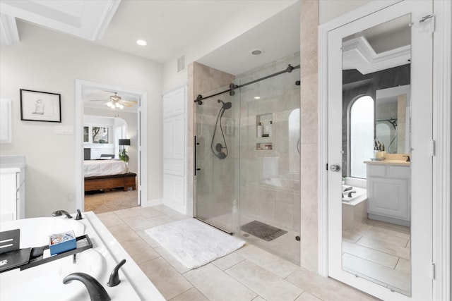 bathroom featuring ceiling fan, tile patterned floors, vanity, and shower with separate bathtub