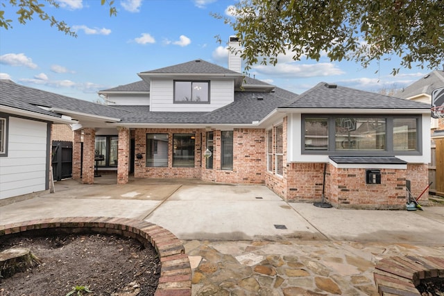 back of house featuring a patio area