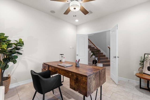 home office with light tile patterned flooring and ceiling fan