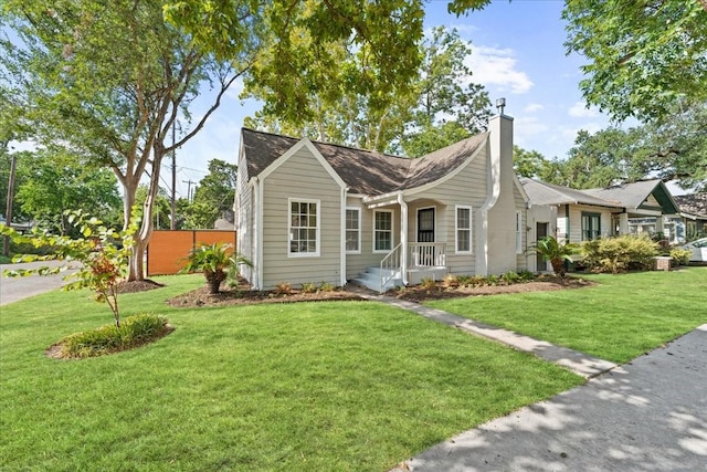 view of front of property with a front lawn