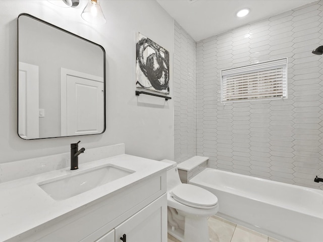 full bathroom with vanity, tile patterned flooring, tiled shower / bath combo, and toilet