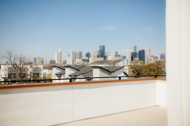 balcony featuring a view of city