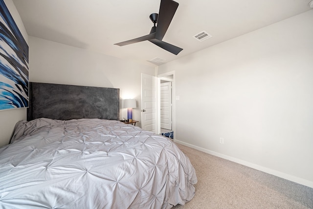 bedroom featuring baseboards, visible vents, ceiling fan, and carpet flooring