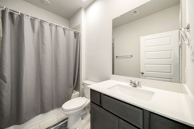 bathroom with toilet, vanity, shower / bath combination with curtain, and visible vents