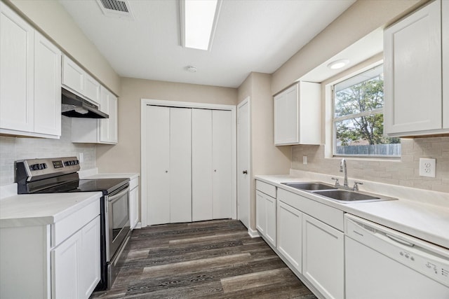 kitchen featuring sink, dishwasher, stainless steel range with electric stovetop, white cabinetry, and dark hardwood / wood-style floors