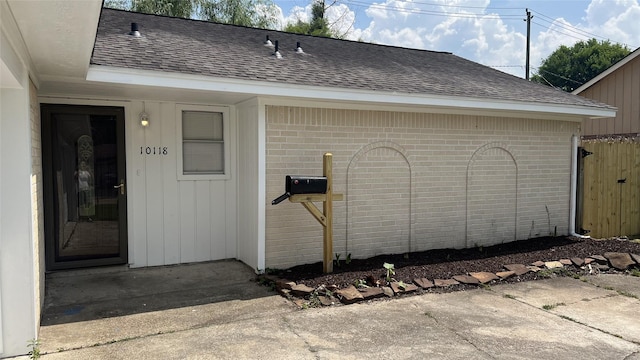 entrance to property with a patio