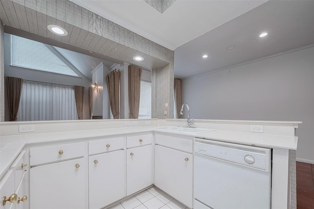 kitchen with light tile patterned flooring, sink, white cabinetry, dishwasher, and kitchen peninsula