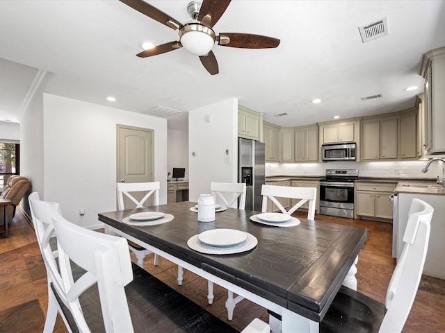 dining room with a ceiling fan, recessed lighting, and visible vents