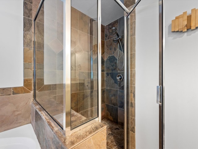 bathroom with a stall shower