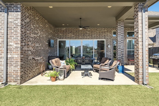 view of patio featuring grilling area and ceiling fan