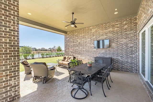 view of patio featuring outdoor lounge area and ceiling fan