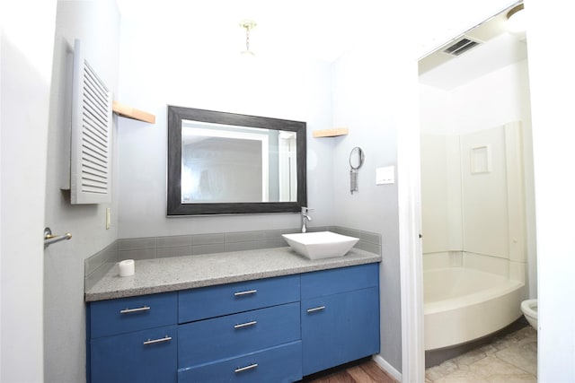 full bathroom with vanity, tile patterned floors, bathing tub / shower combination, and toilet