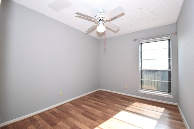 unfurnished room featuring hardwood / wood-style floors, a textured ceiling, and ceiling fan