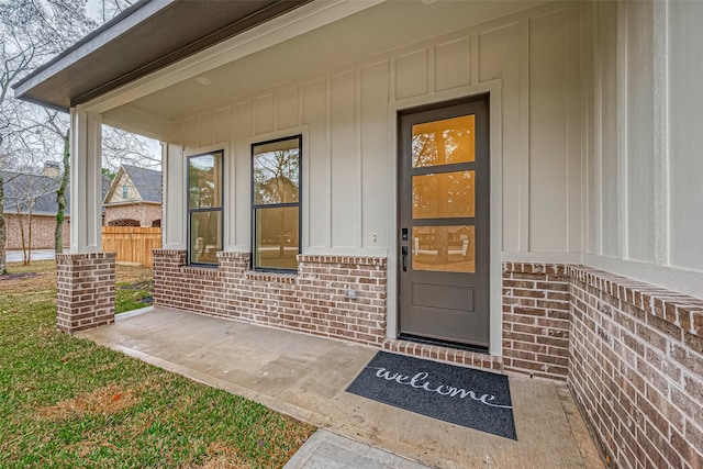 entrance to property with covered porch