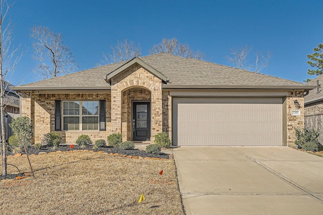 ranch-style home with a garage