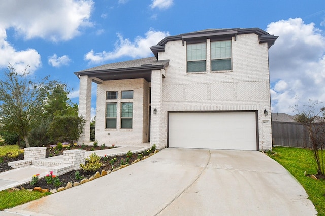 view of front of property featuring a garage