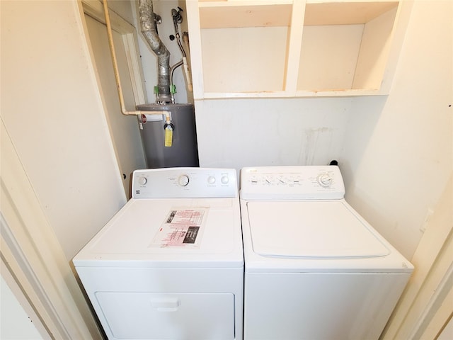 laundry area with separate washer and dryer and gas water heater