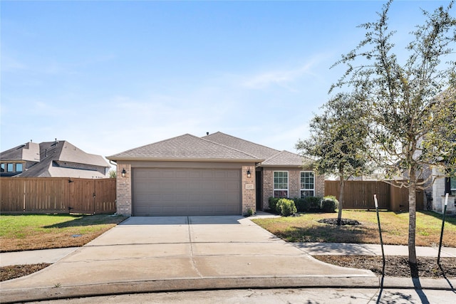 view of front of house featuring a garage, brick siding, fence, and driveway