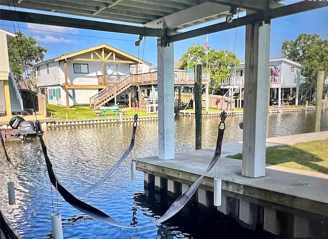 dock area featuring a water view