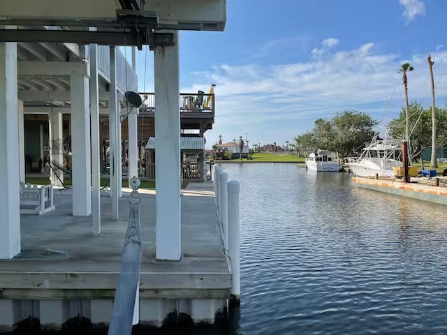 dock area featuring a water view