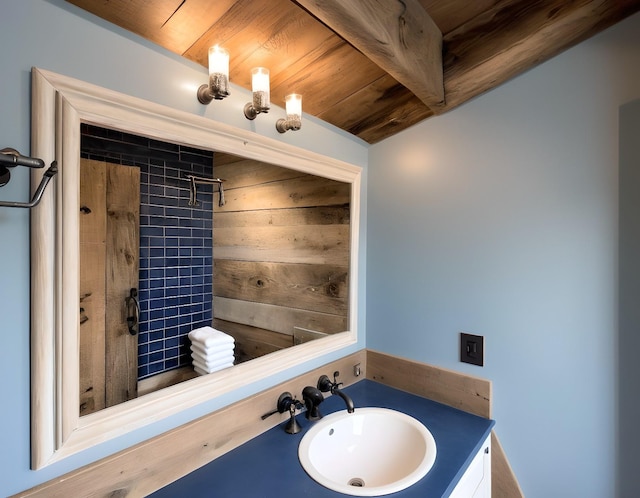 bathroom with vanity and wooden ceiling