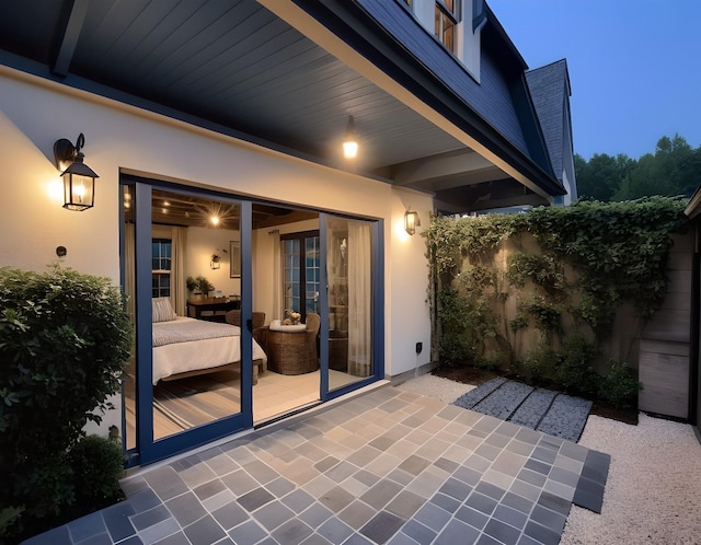 view of patio terrace at dusk